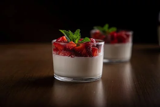 panna cotta vanilla dessert with berry sauce