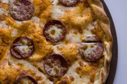 pepperoni pizza melted cheese close up